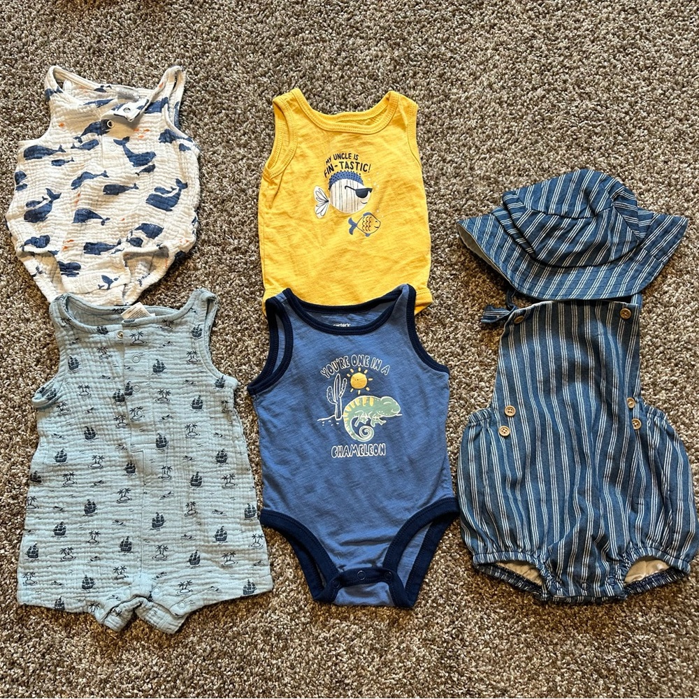 gently used baby boy clothes - NB and 0-3 months. Most have never been worn.